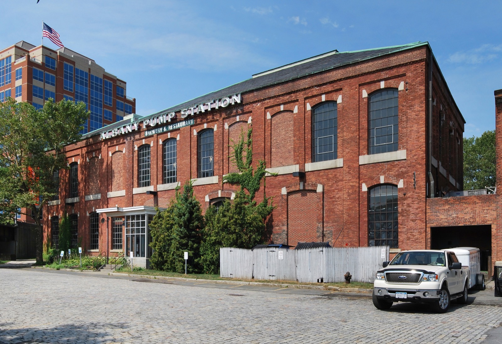 Panoramic view of the brick Albany Pump Station building