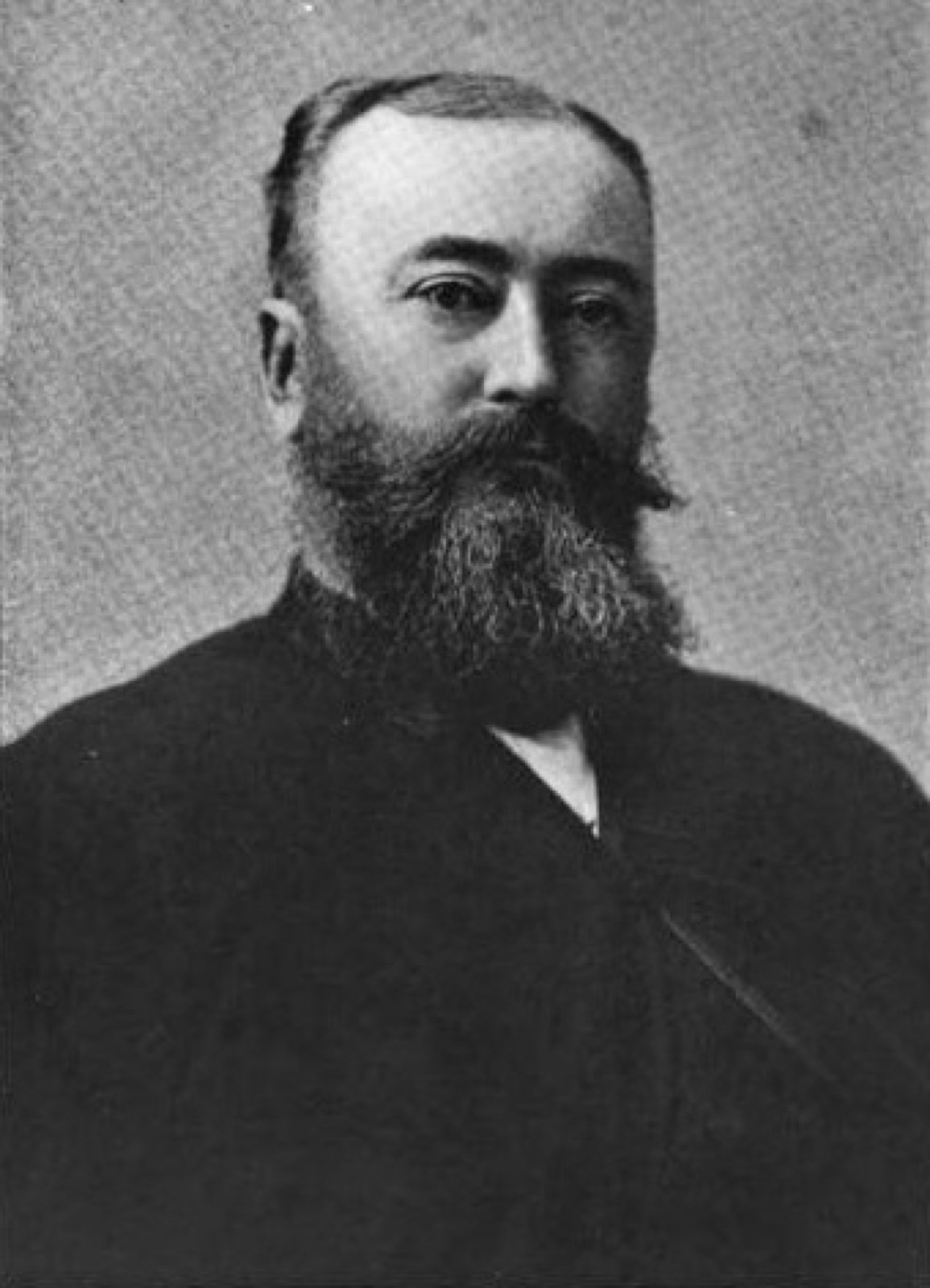Portrait of Michael N. Nolan, a man with a full white beard